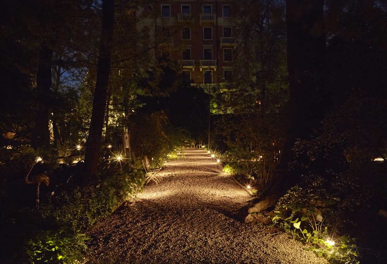 Italy Milan Brera Botanical Garden night view of main route - building lights