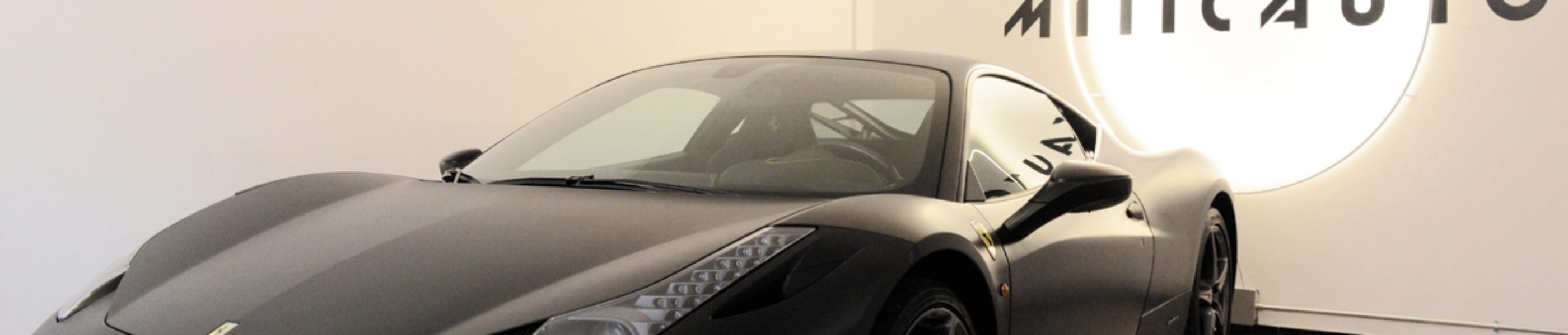 Showroom Miticauto ferrari car - retail lighting design