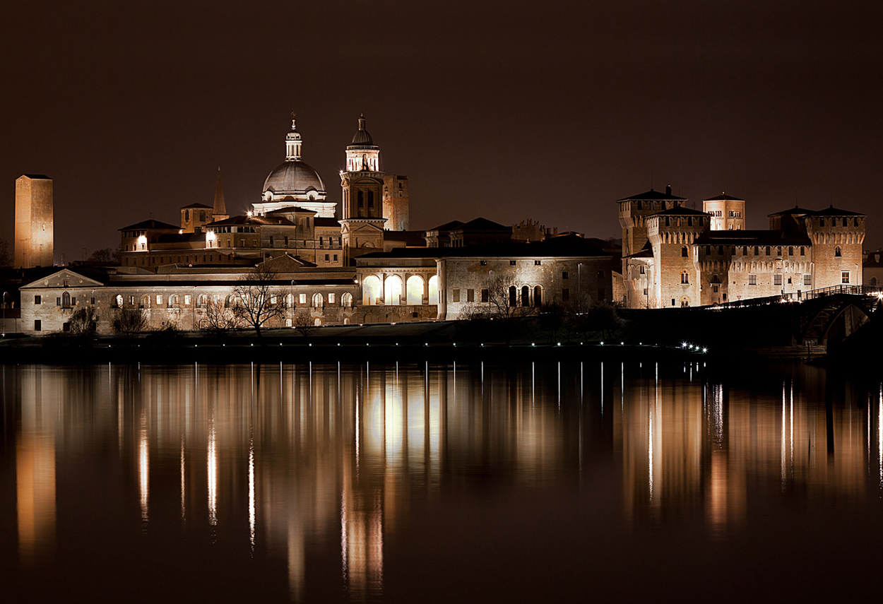 Night view of the outline of the city of Mantua