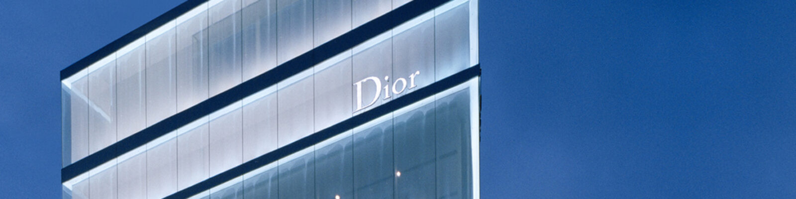 Detail of the illuminated facade of the Dior building