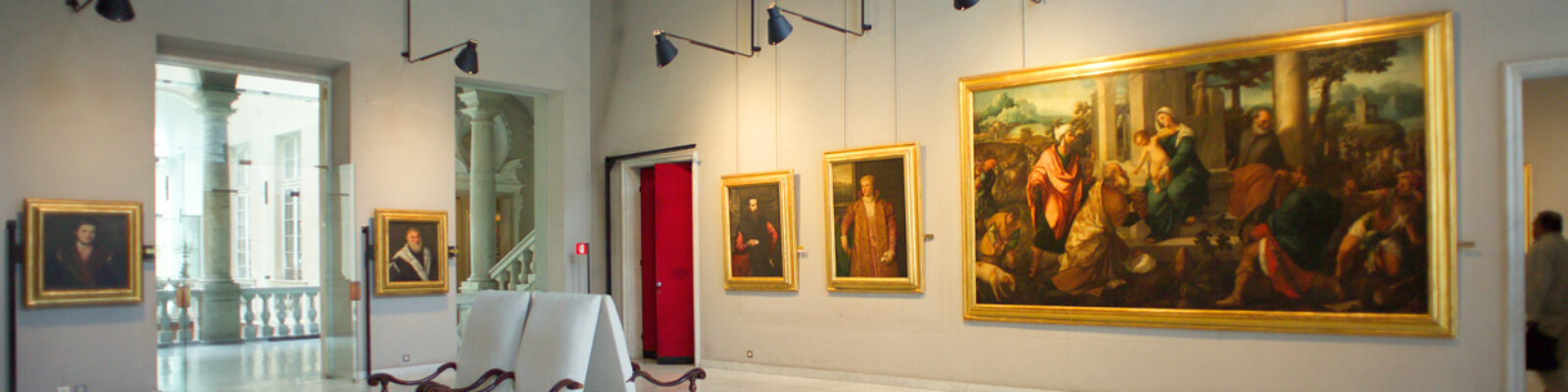 One of the rooms with the works on display and the lighting fixtures